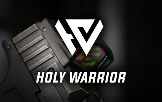 holy warrior canada logo displayed over close up handgun slide with red dot sight and green reflective lens