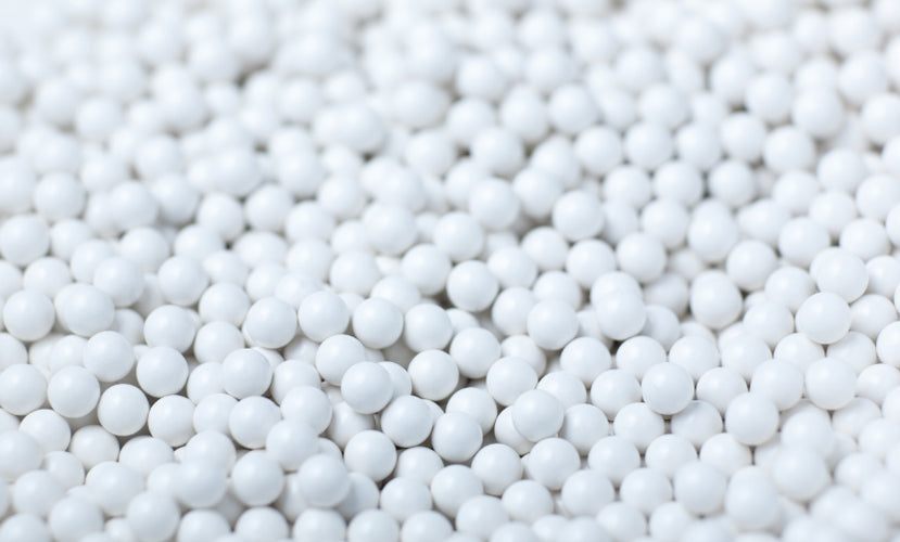 BLS 0.12g airsoft BBs for grenade white polymer pellets closeup ideal for airsoft grenade refills