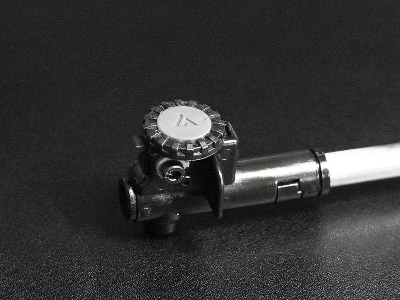 Airtech conversion asg component part with detailed adjustment knob on black surface