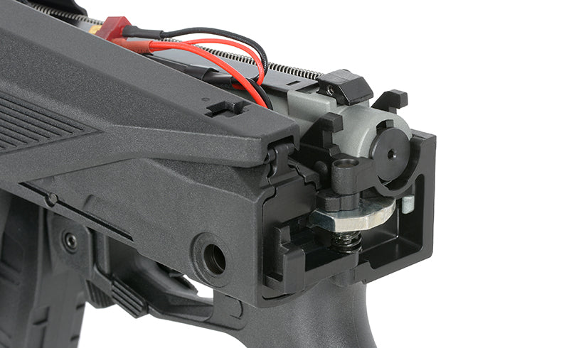 Close-up of WELL PRO AEG ak12 airsoft gun internal gearbox and wiring components