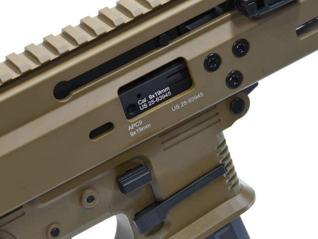 Close-up of ARCHWICK B&T apc9 tan airsoft GBBR showing detailed receiver and markings