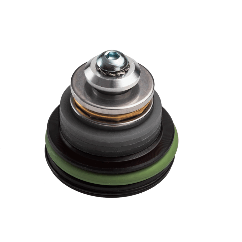 Close-up of FPS SOFTAIR PISTON HEAD TPPA with metal and rubber components for airsoft guns