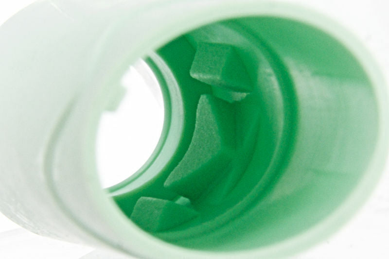 Close-up view inside a green plastic INTERNE part by MAPLE LEAF featuring MAPLE LEAF BUCKING design