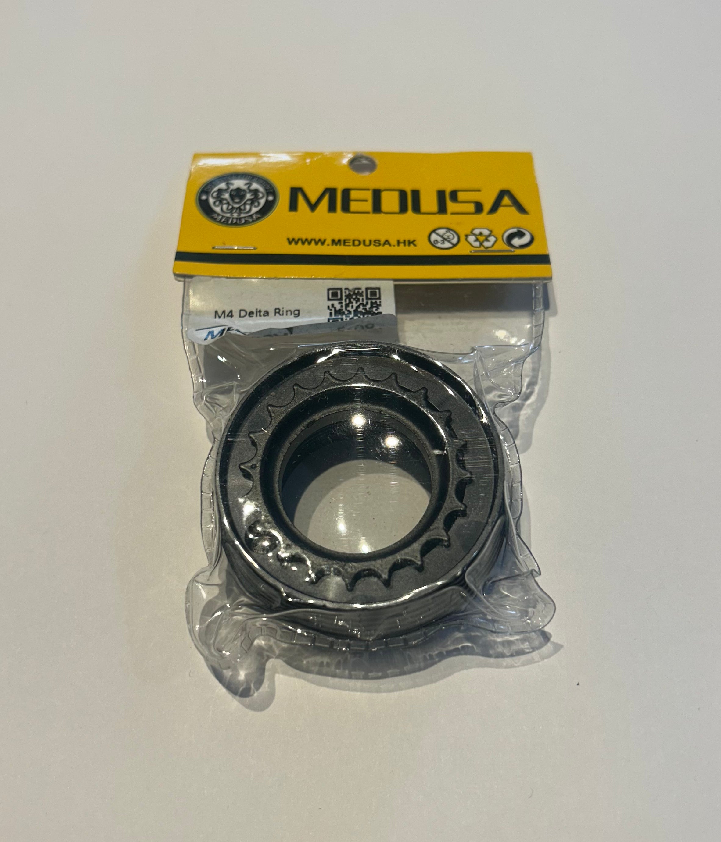MEDUSA delta ring m4 airsoft in black packaged with yellow branded label for external accessory