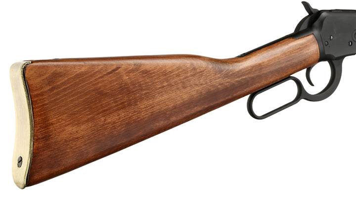 Close-up of wooden stock and metal lever of WINCHESTER AIRSOFT rifle by Ma boutique
