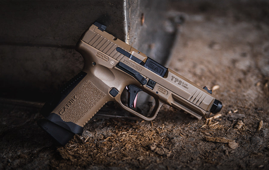 Airsoft PISTOL in black case with magazine and ammo box displayed on satin fabric