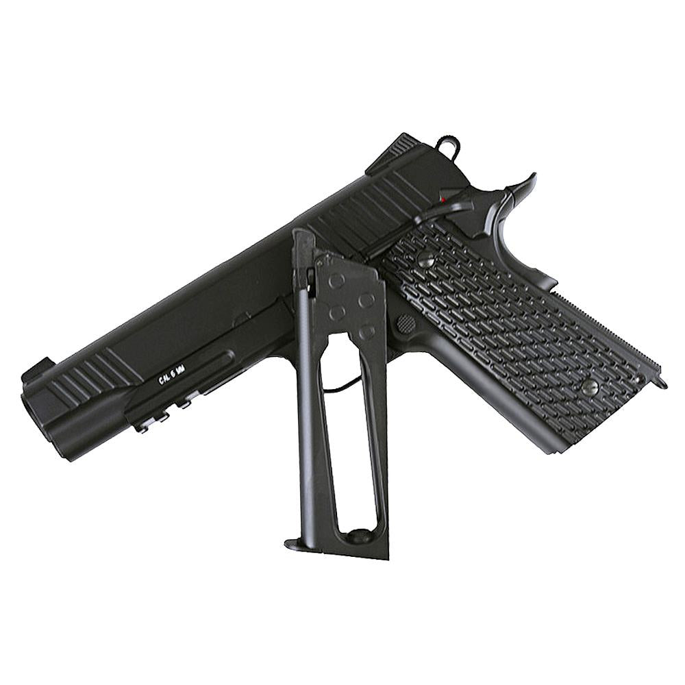 KWC M1911 black metal pistol with textured grip and detachable magazine shown beside the gun
