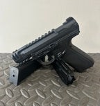 ACTION ARMY black aap-01c assasin airsoft pistol with two magazines on textured surface