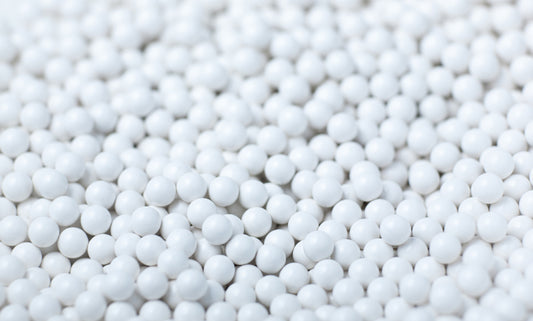 BLS 0.12g airsoft BBs for grenade white polymer pellets closeup ideal for airsoft grenade refills