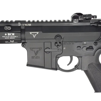 Close-up of DOUBLE BELL M4 AEG AIRSOFT gun body with detailed safety and trigger features