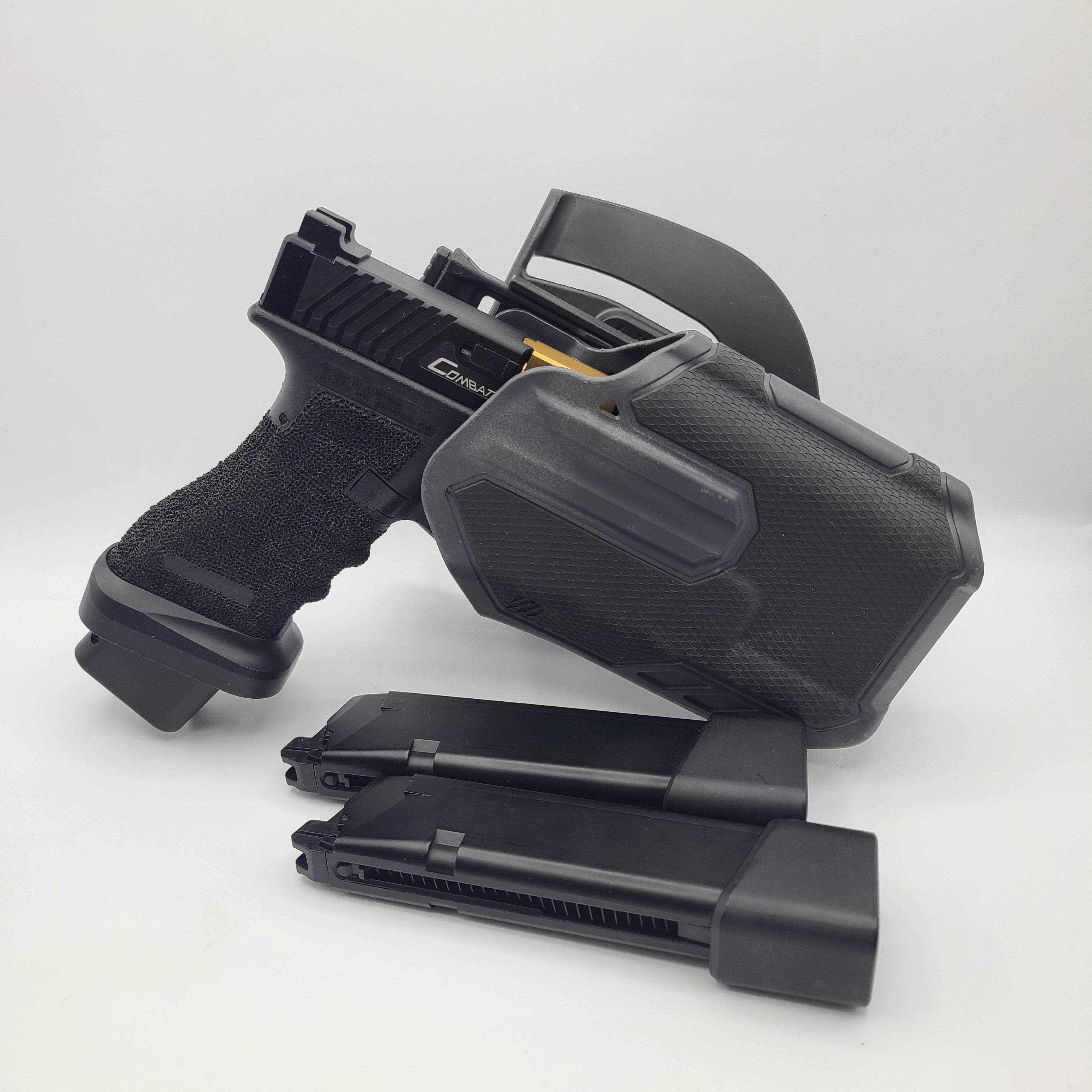 Army Armament Glock A34 airsoft pistol with holster and extra magazine for enhanced gameplay