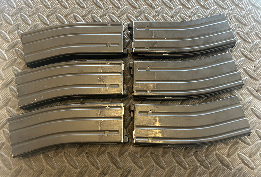 Set of six Tokyo Marui M4 MWS GBBR magazine shells for airsoft enthusiasts and tactical use