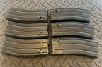 Set of six Tokyo Marui M4 MWS GBBR magazines designed for airsoft enthusiasts