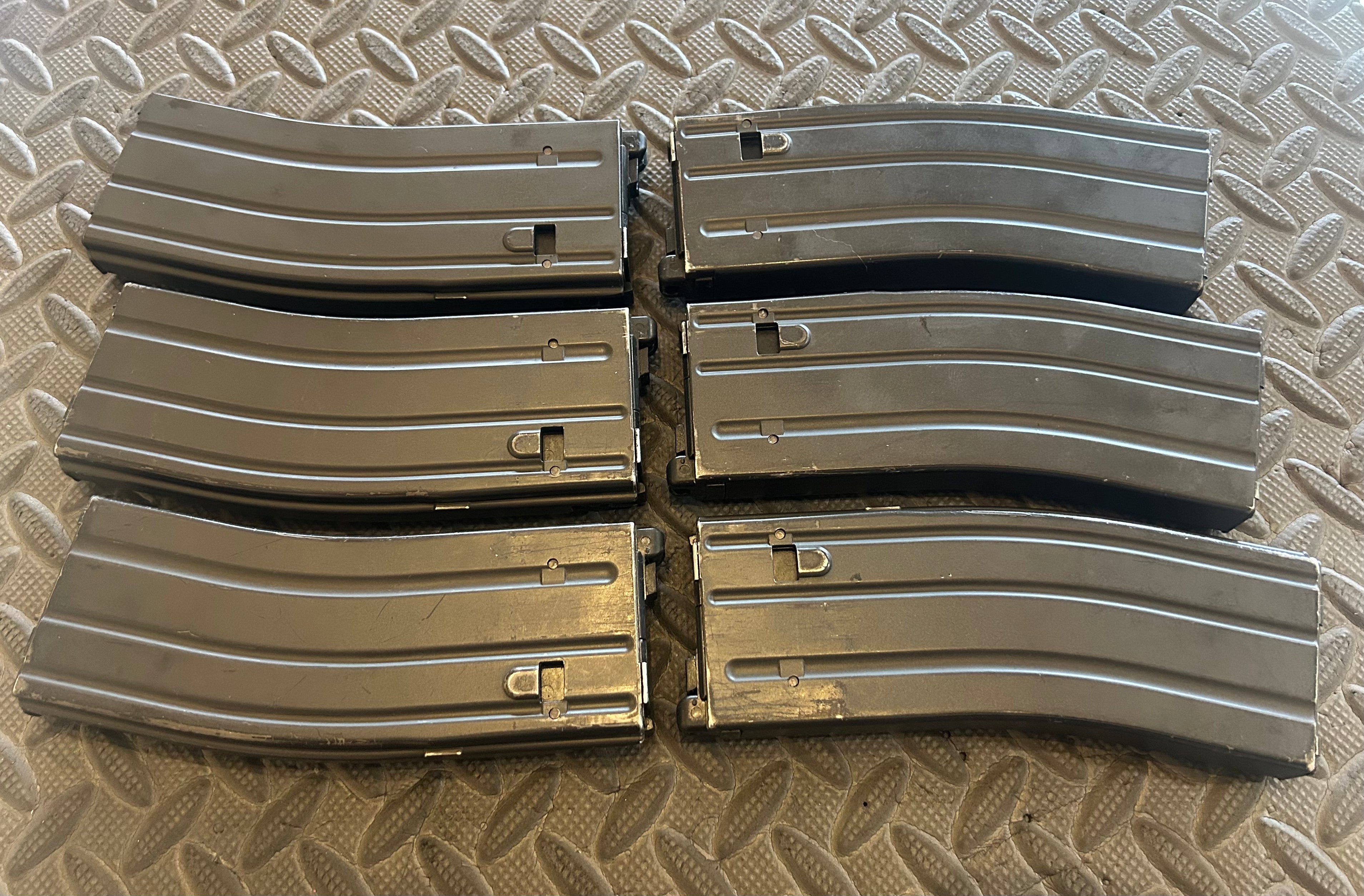 Set of six Tokyo Marui M4 MWS GBBR magazines designed for airsoft enthusiasts