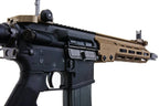 Réplique airsoft vfc colt urgi GBBR avec corps noir et garde-main tan pour tir réaliste
